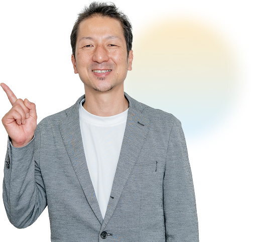 指を差すスタッフ