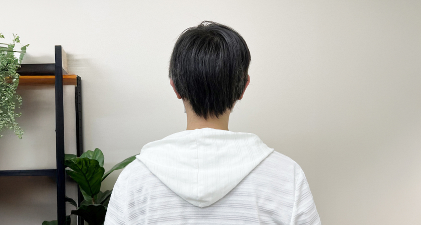 コンサルティング業に就職したO.Tさんの後ろ姿